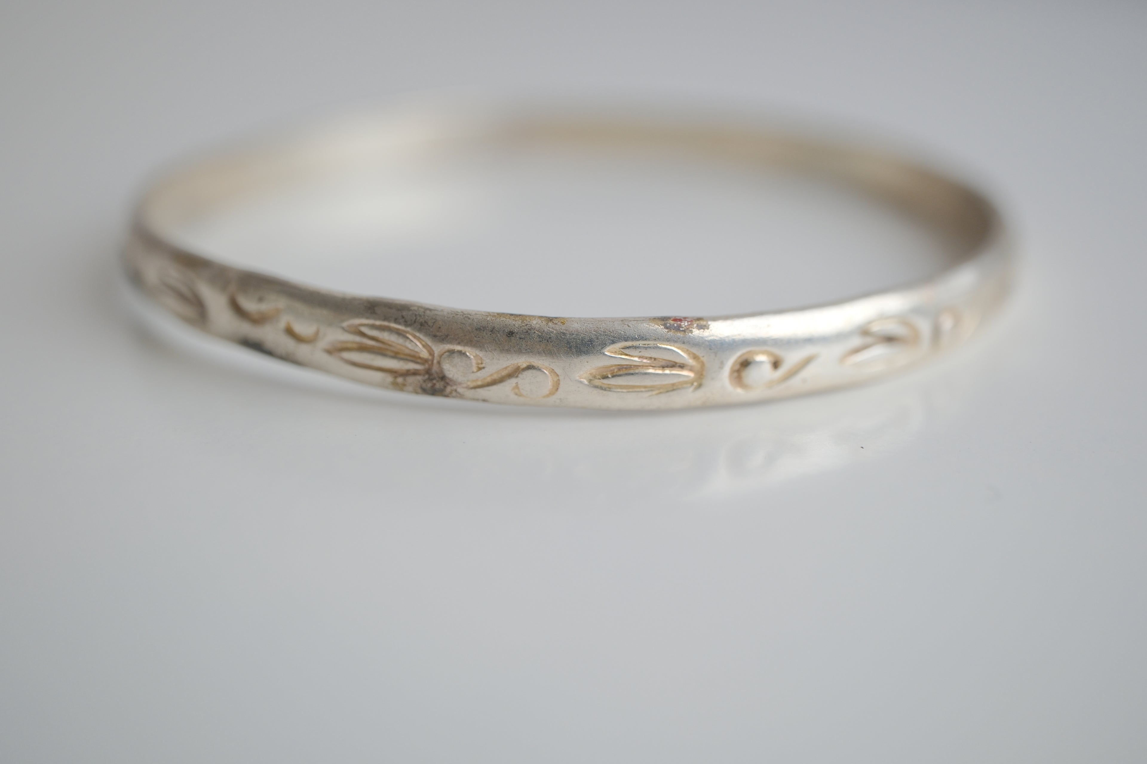 Sterling silver bangle bracelet with etched artwork