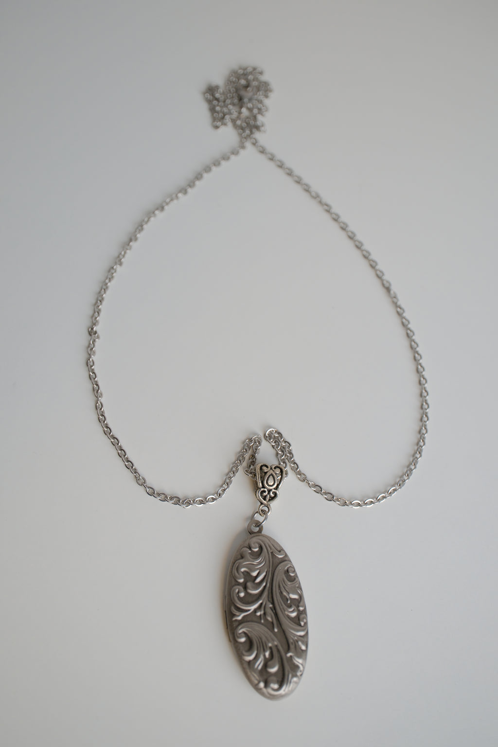 Silver oval locket necklace