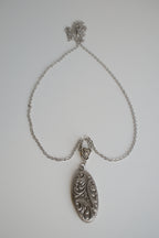Silver oval locket necklace