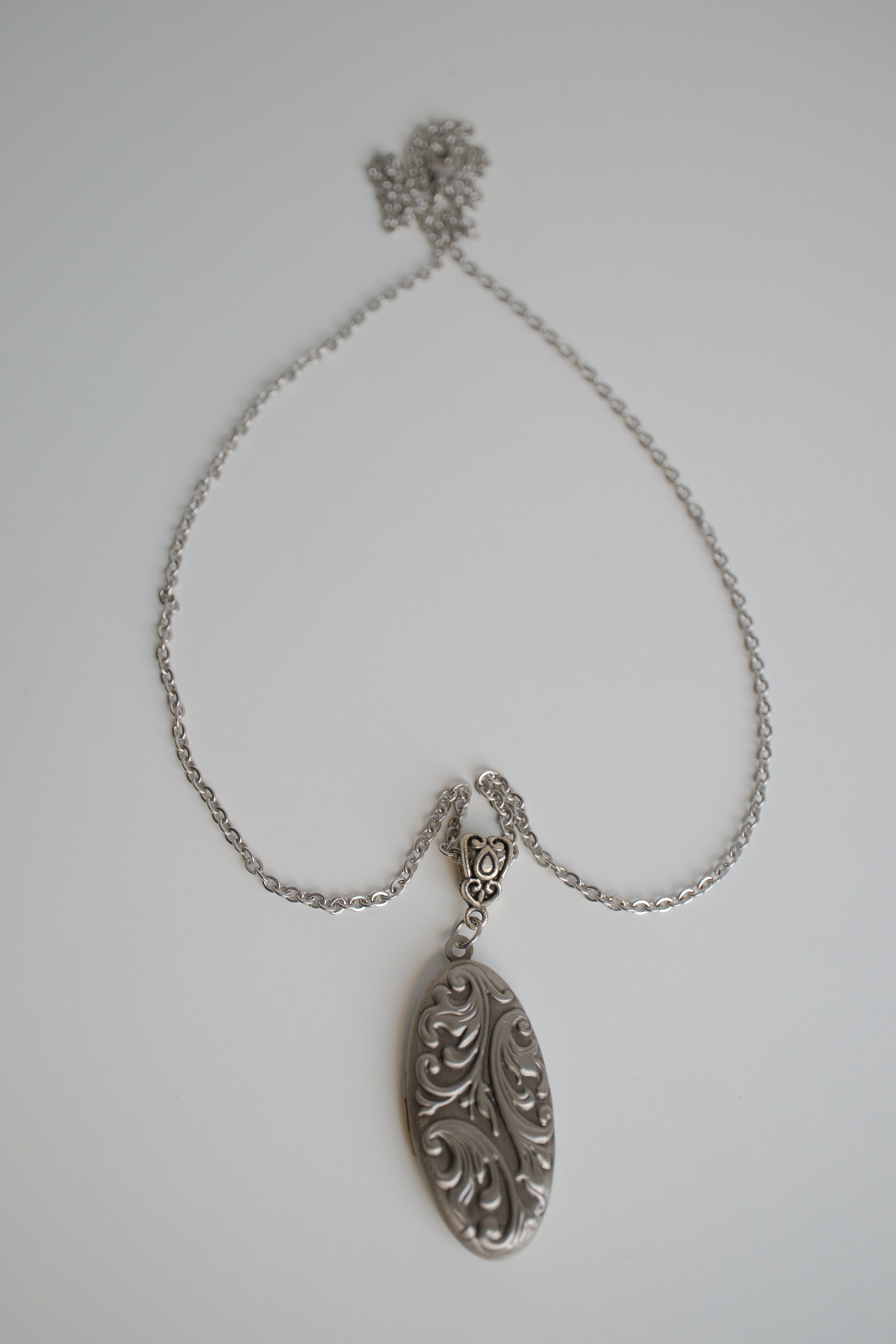 Silver oval locket necklace