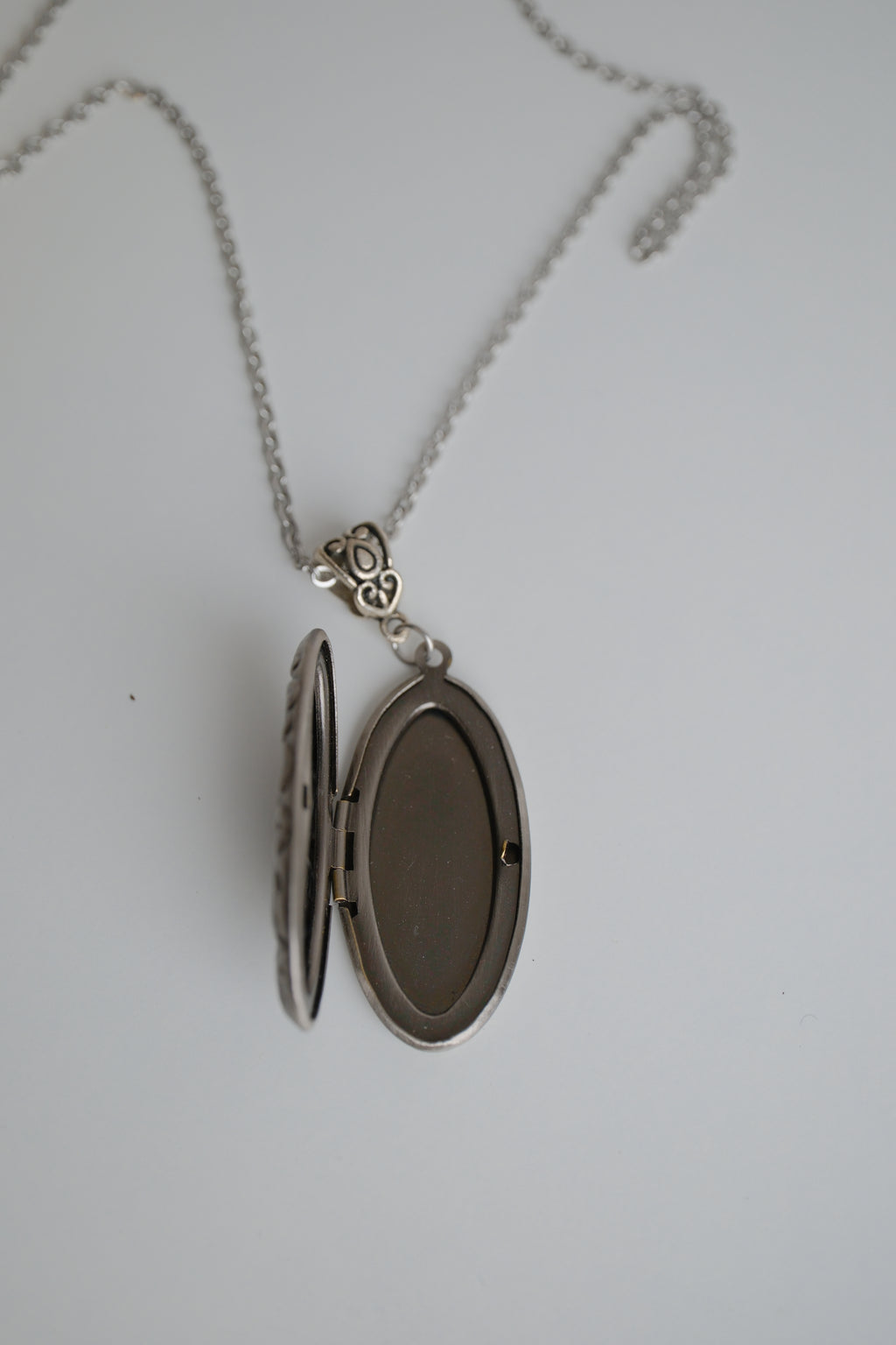 Silver oval locket necklace