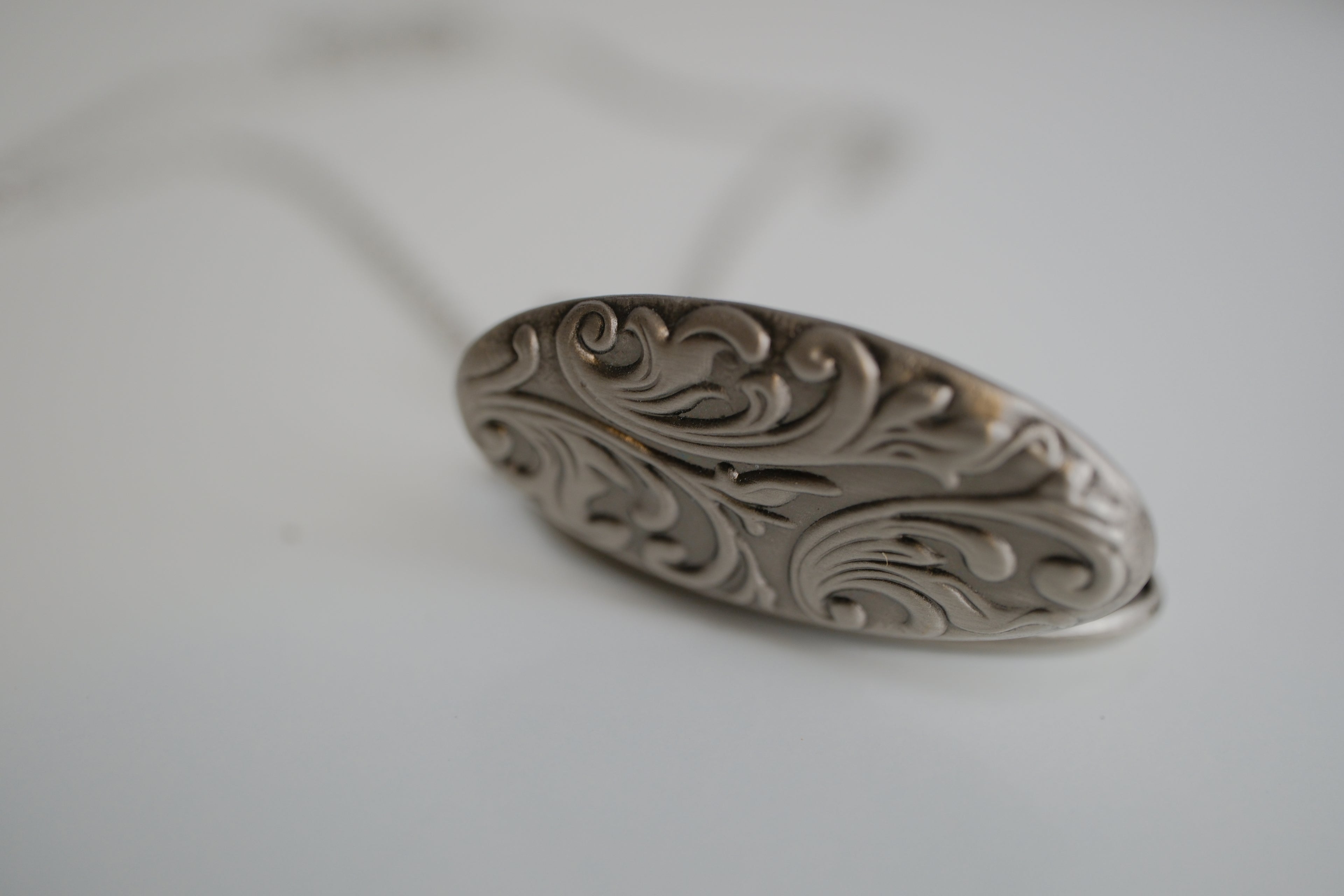Silver oval locket necklace