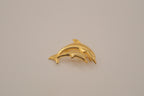 Gold-tone double dolphin brooch