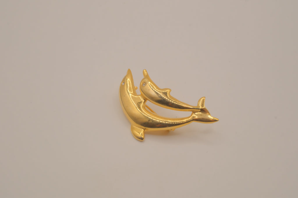 Gold-tone double dolphin brooch