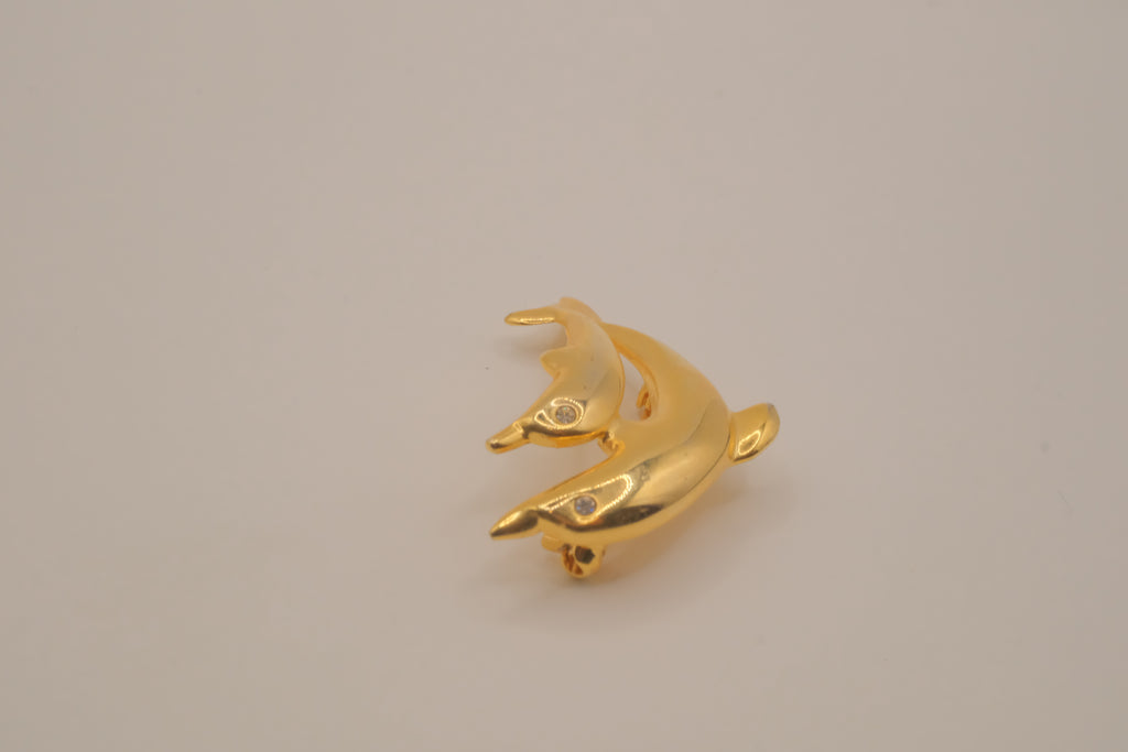 Gold-tone double dolphin brooch