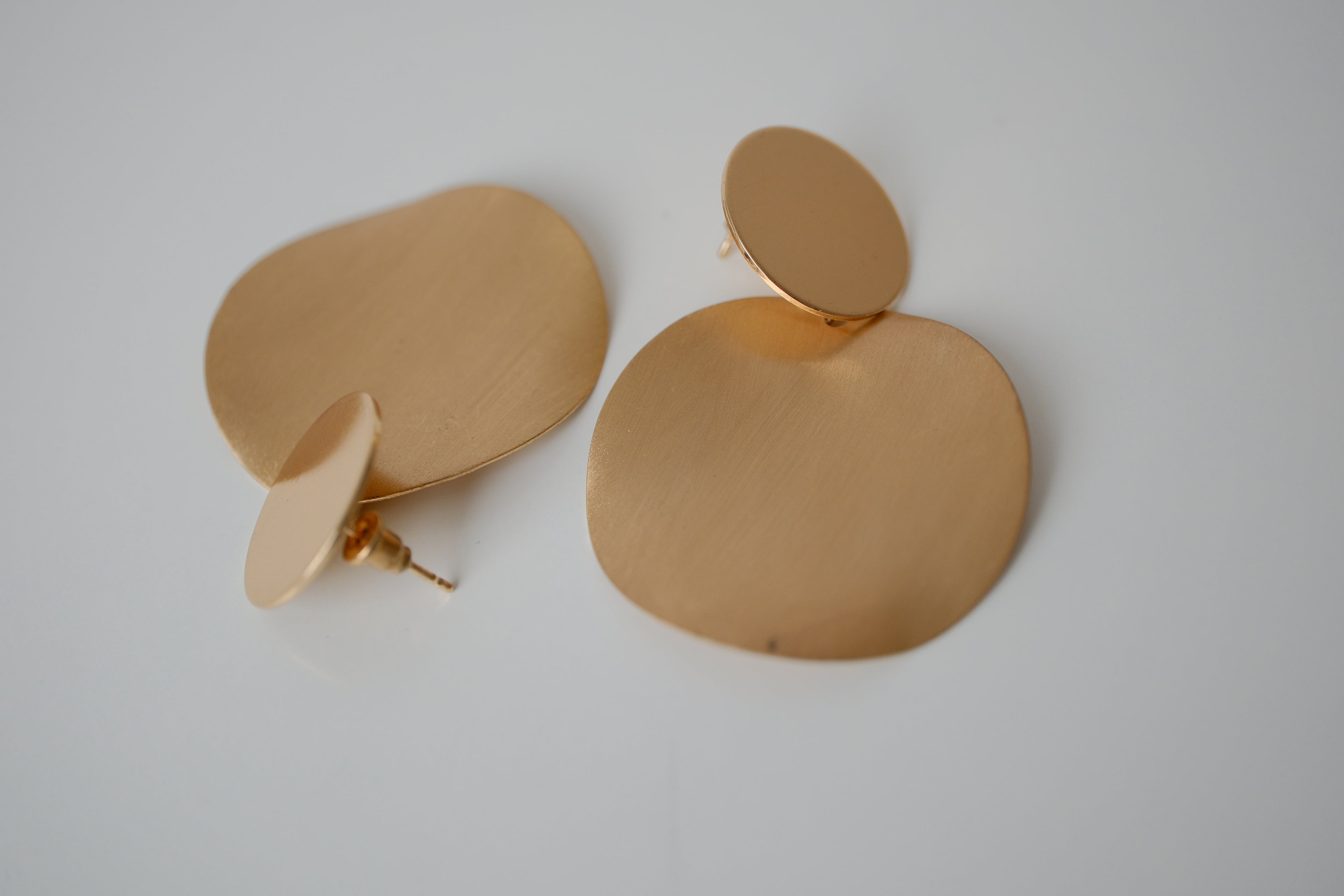 Double disc drop earrings