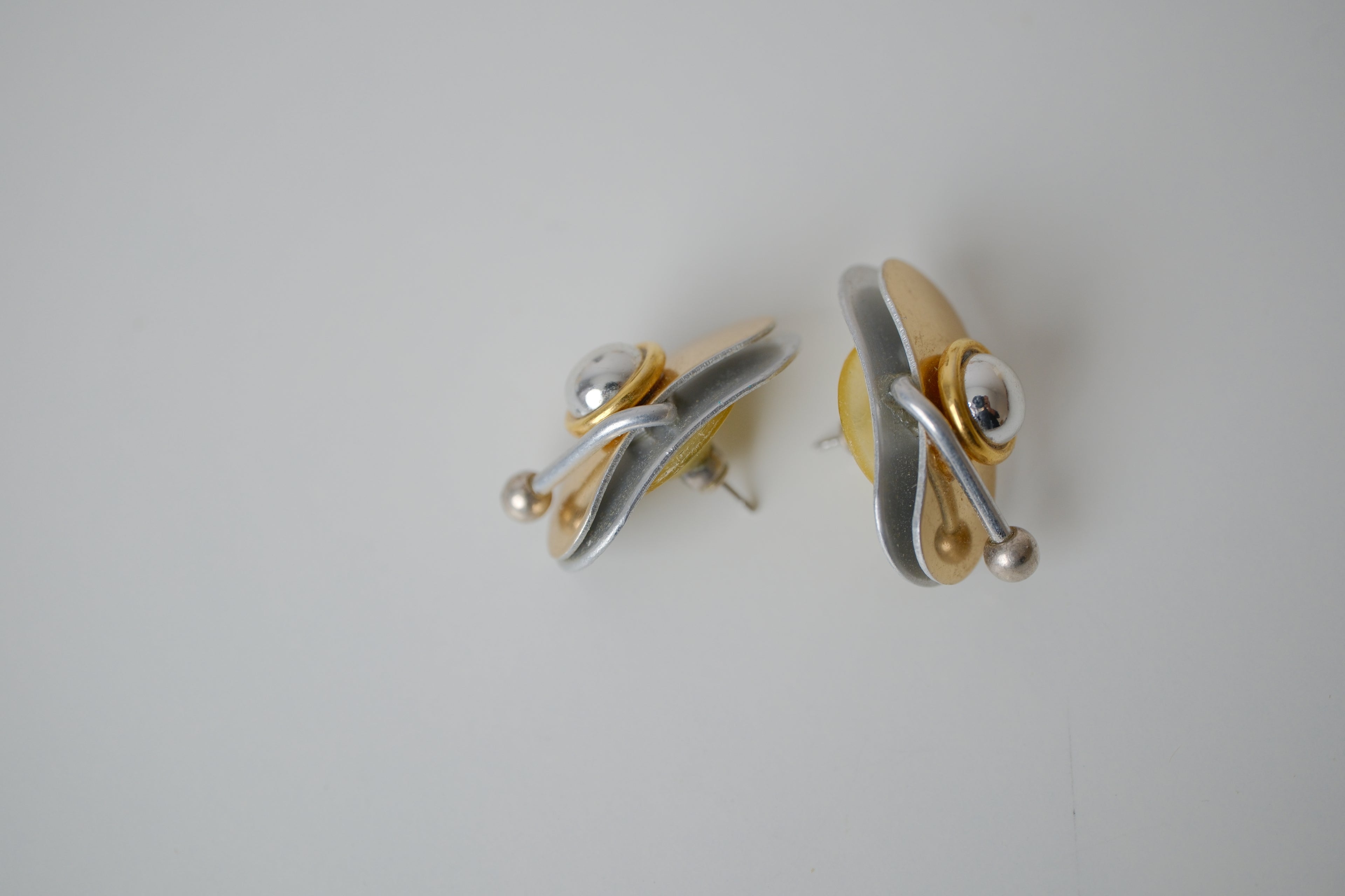 Abstract two-tone earrings