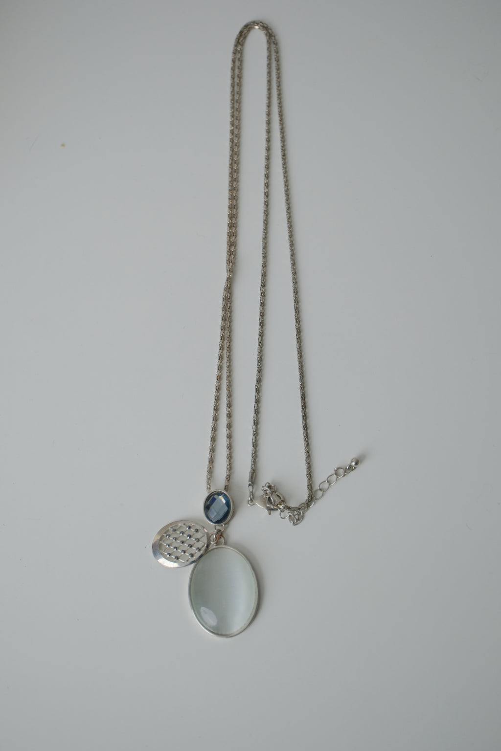 Silver toned multi pendant necklace
