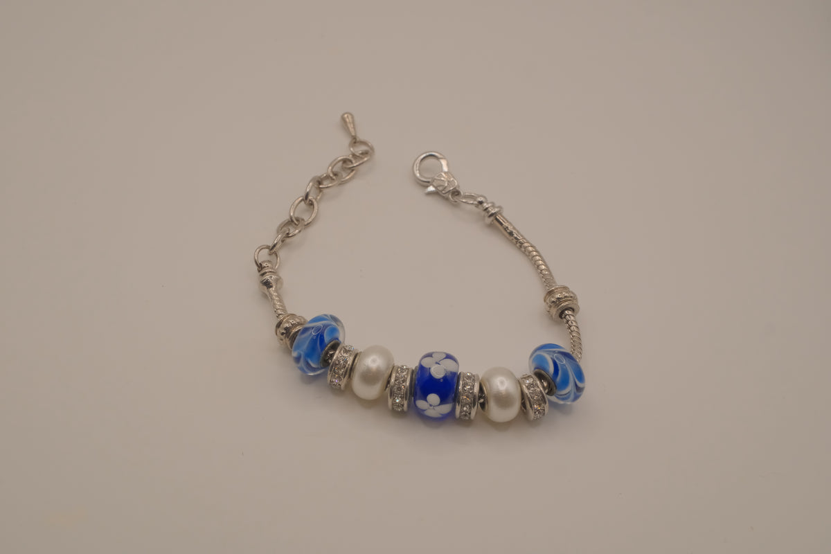 Silver-tone Blue and White Pearl charm bracelet