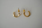 Gold curved bar stud earrings