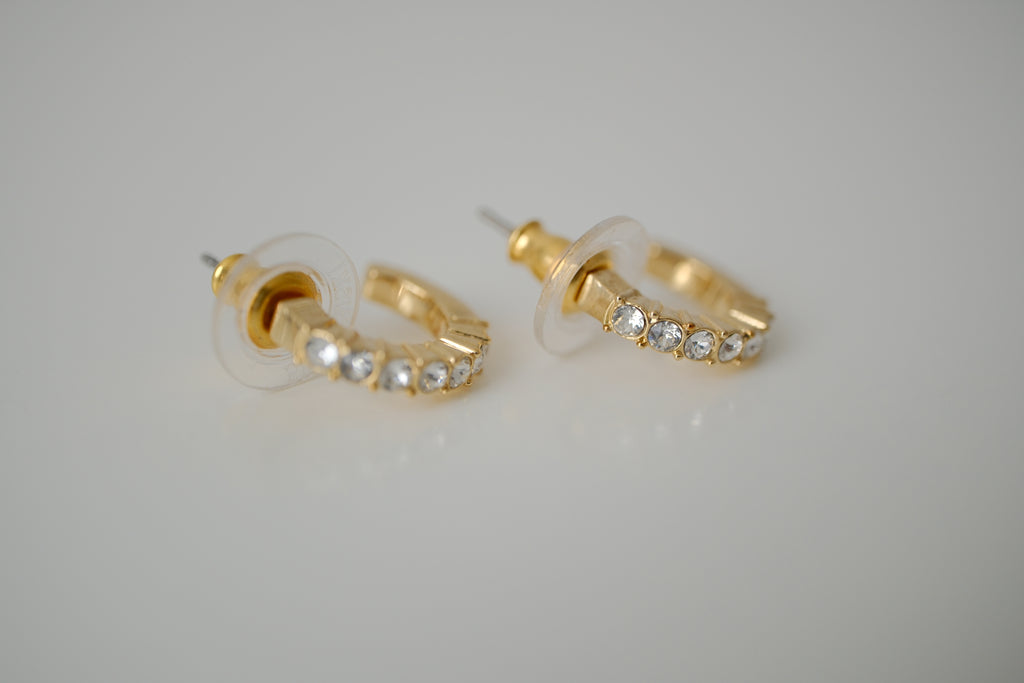 Gold curved bar stud earrings