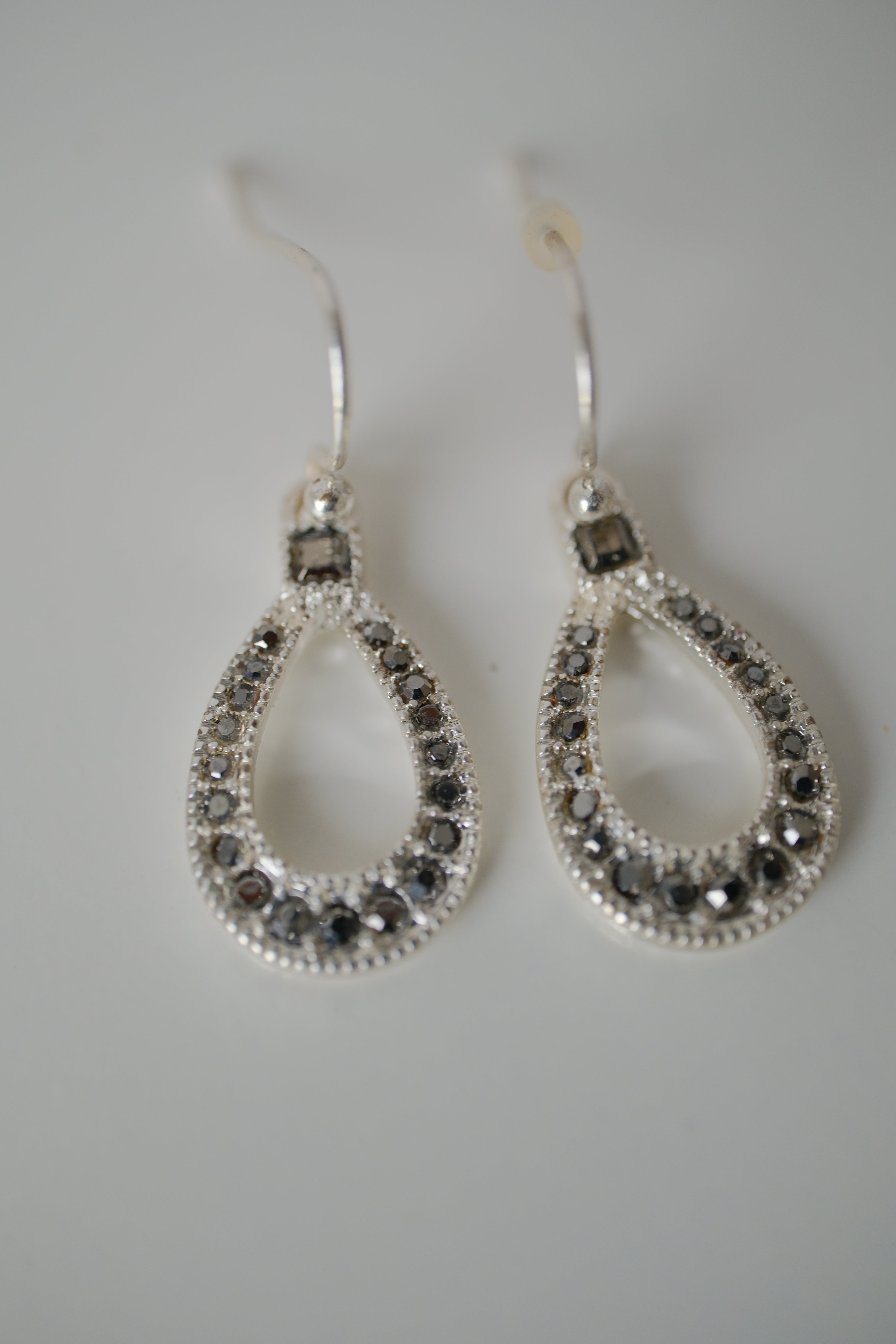 Sterling silver pear-shaped dangle earrings
