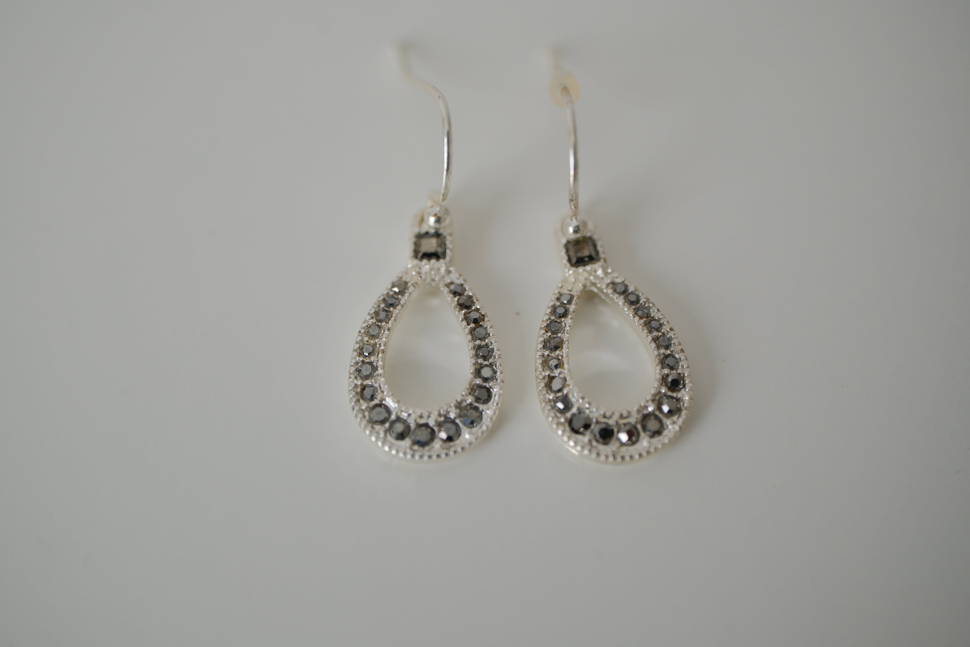 Sterling silver pear-shaped dangle earrings