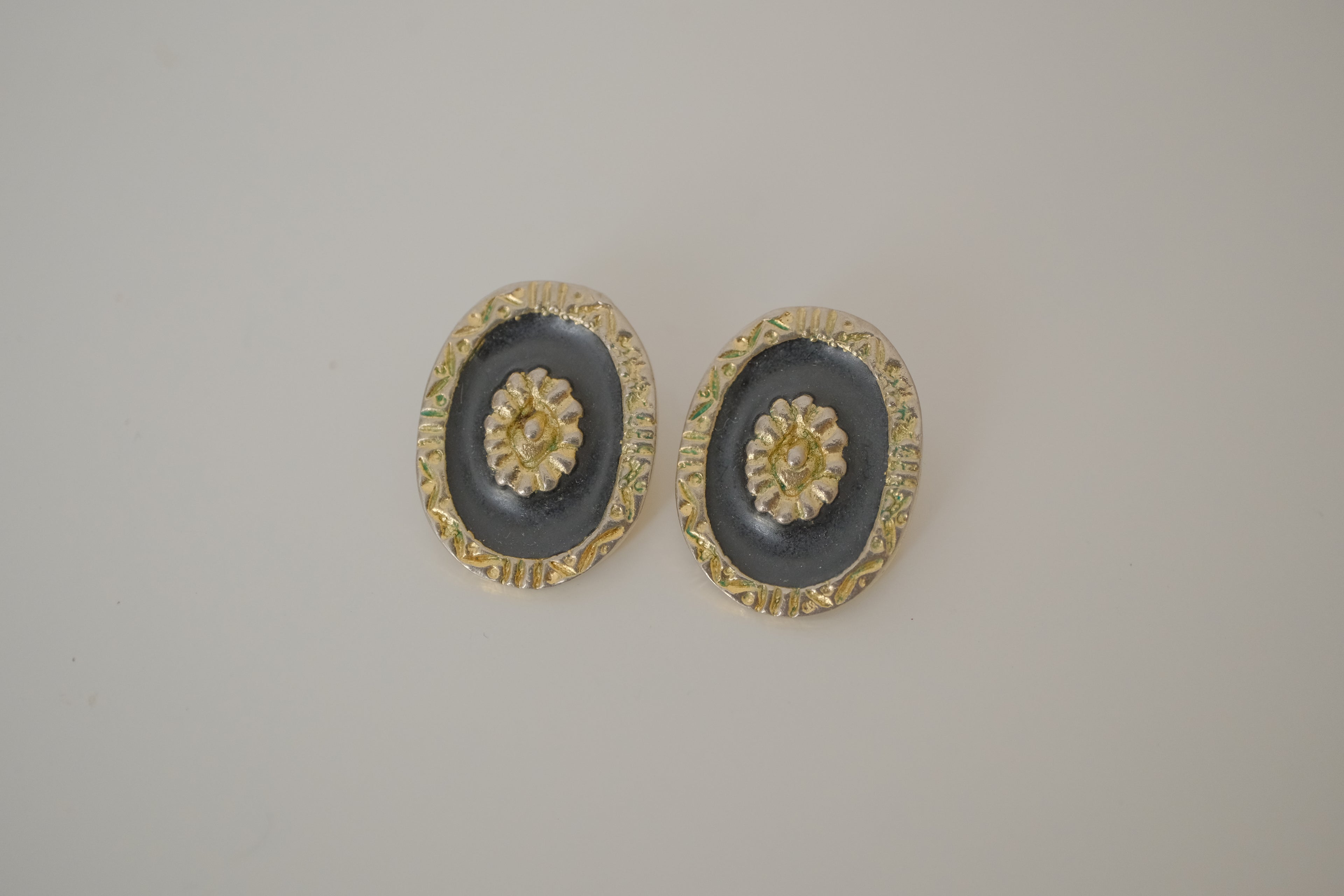Vintage black and gold oval clip-on earrings