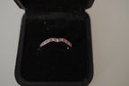 Silver tone pink and white curved "wishbone" ring