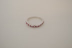 Silver tone pink and white curved "wishbone" ring