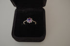 Silver tone iridescent stone ring