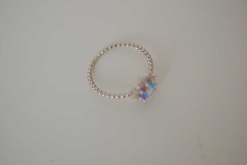 Silver tone iridescent stone ring
