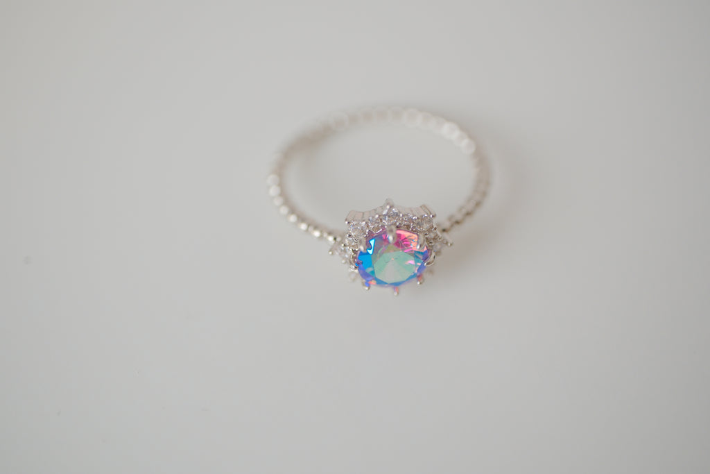 Silver tone iridescent stone ring