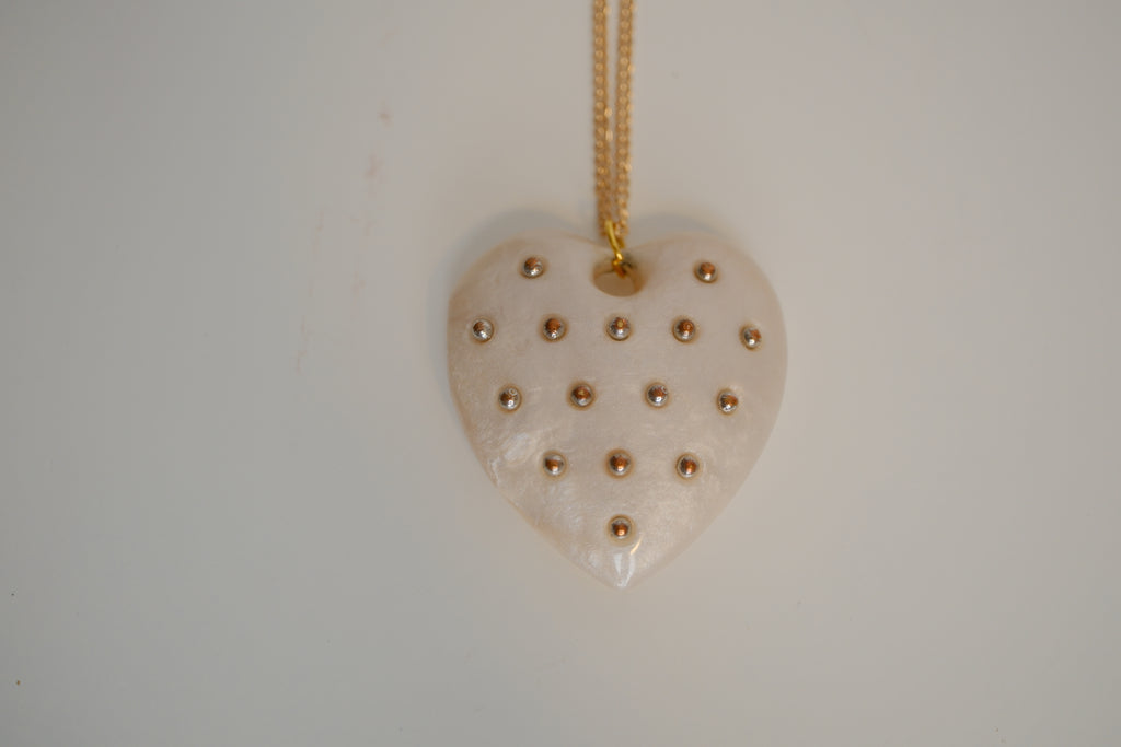 Ivory Heart pendant with gold studs