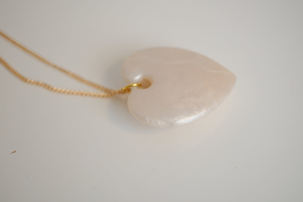 Ivory Heart pendant with gold studs