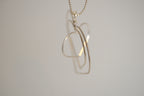 Triple-layered open heart pendant necklace
