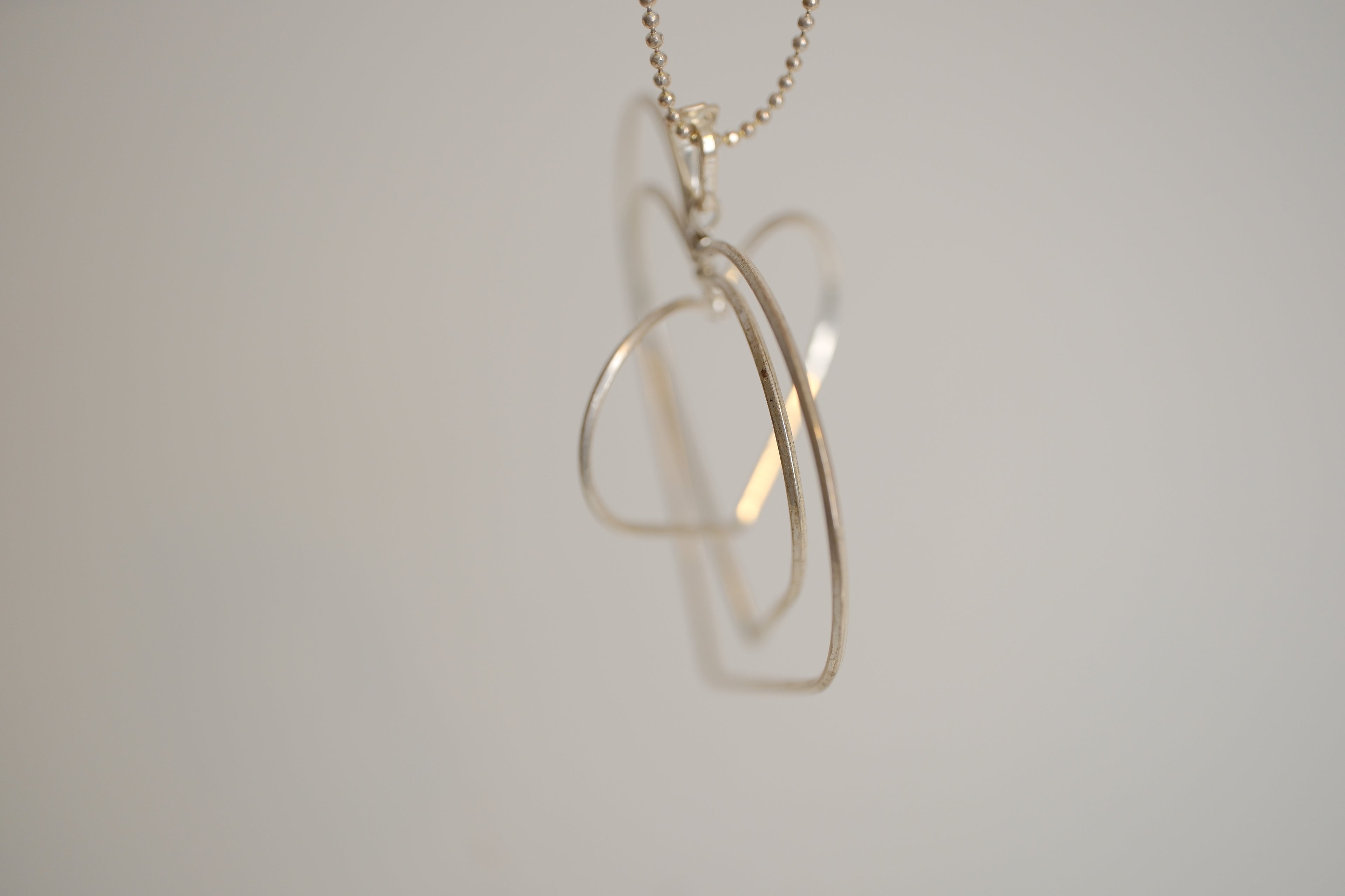Triple-layered open heart pendant necklace