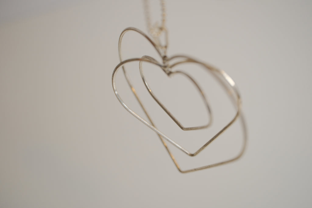 Triple-layered open heart pendant necklace