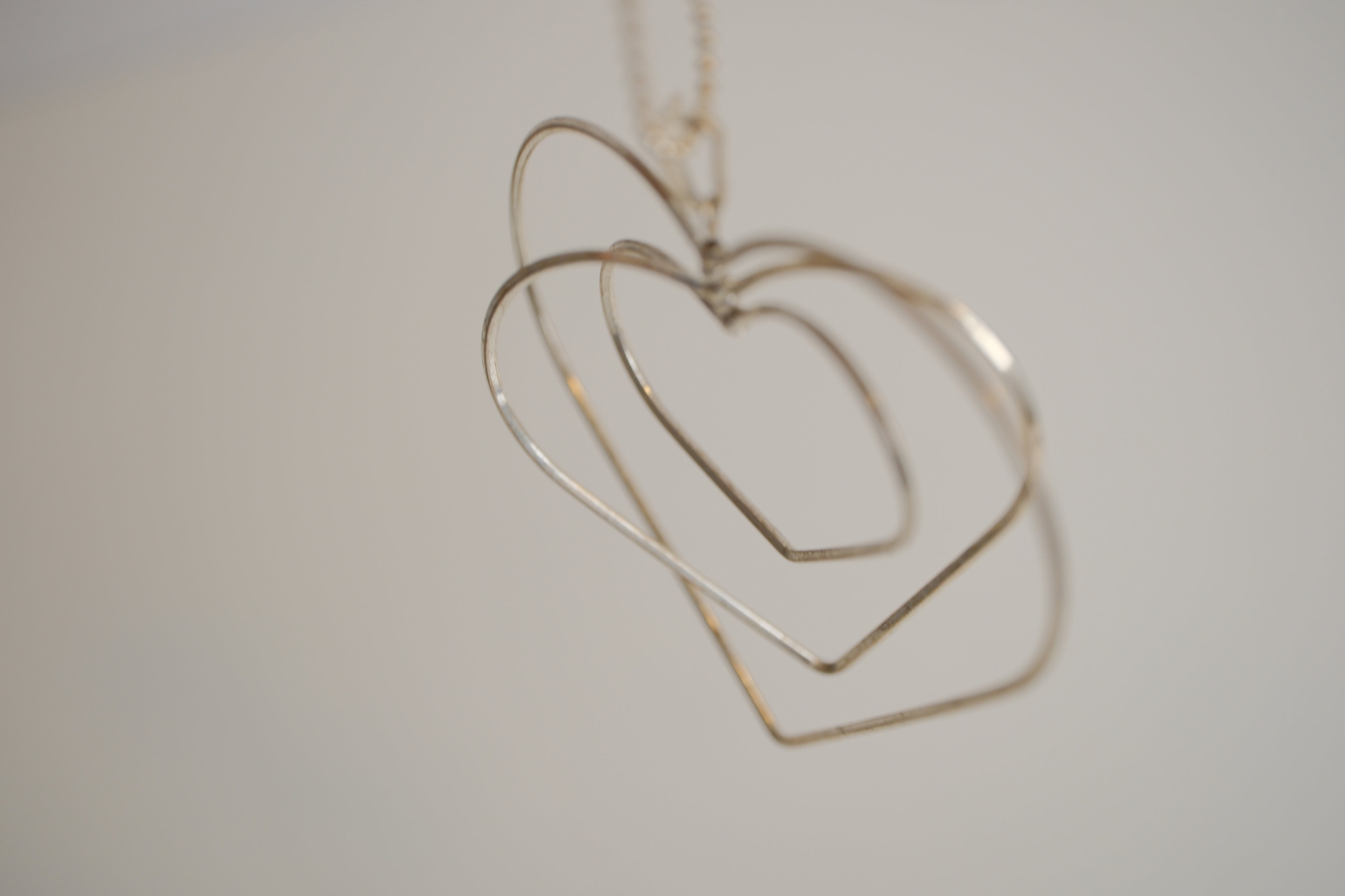 Triple-layered open heart pendant necklace