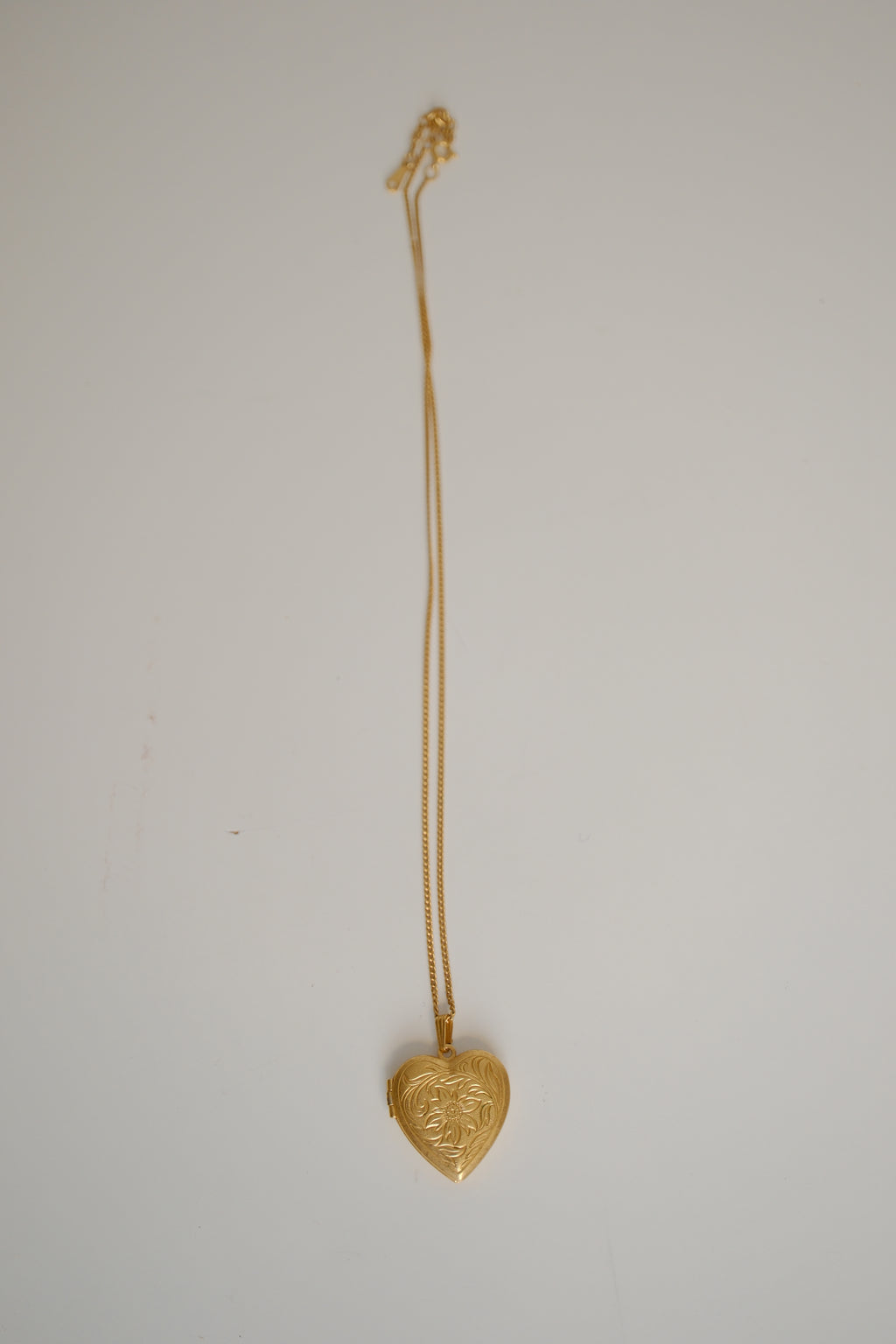Gold toned Heart-shaped locket necklace