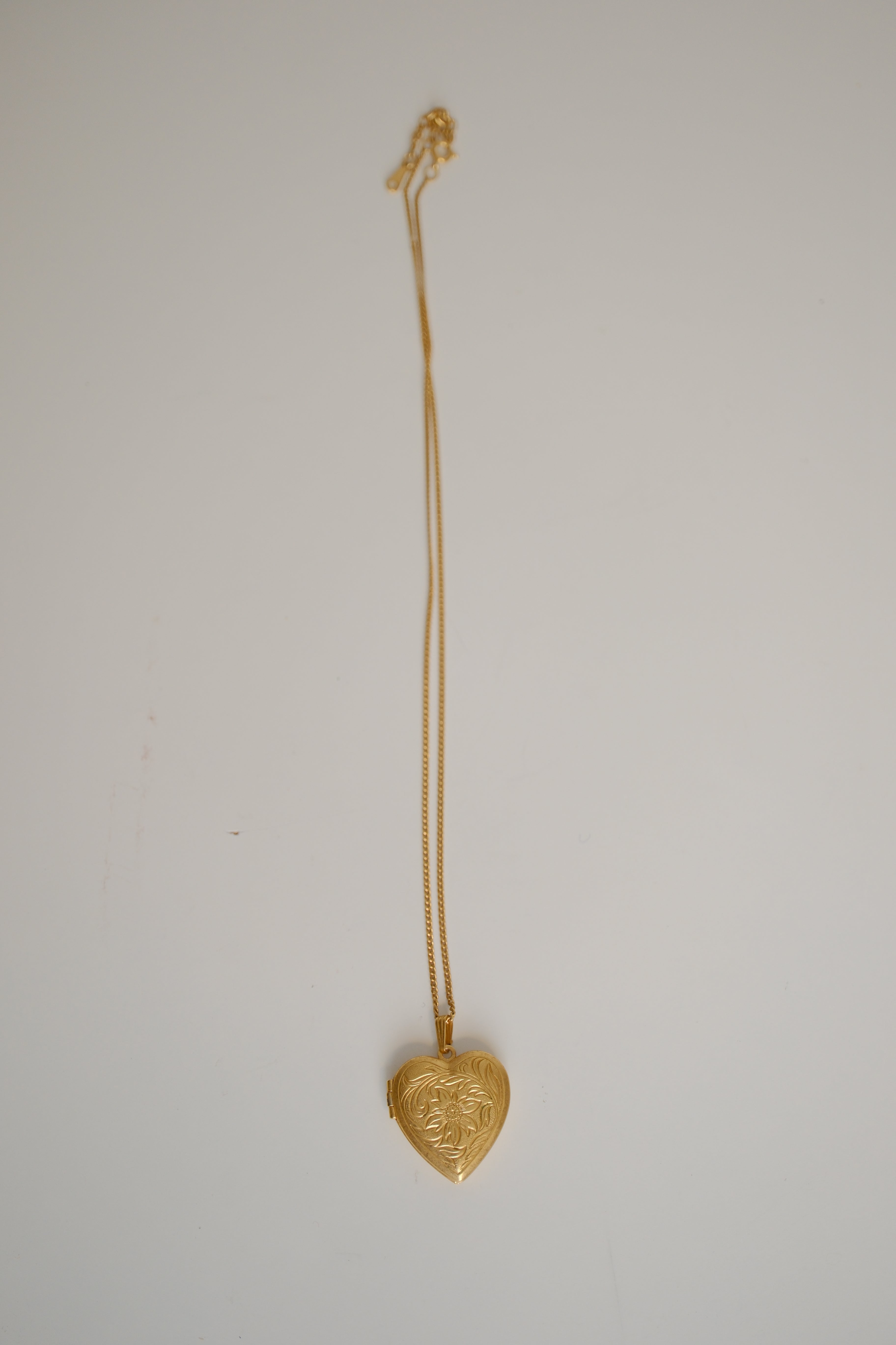Gold toned Heart-shaped locket necklace