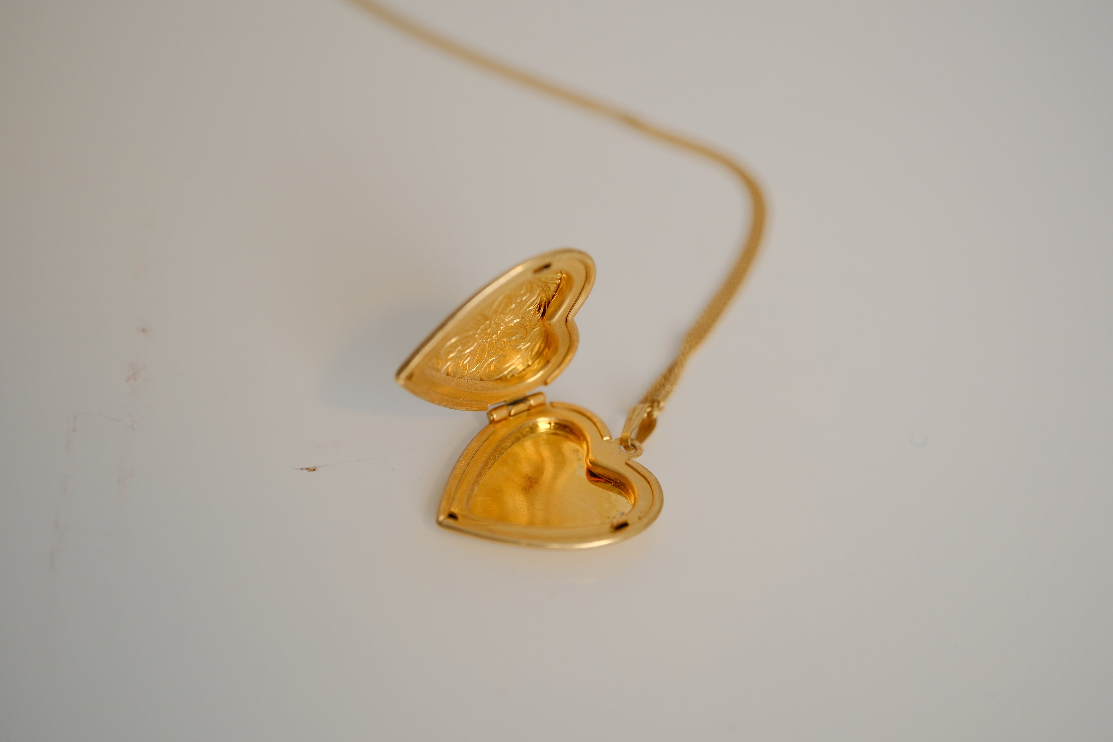 Gold toned Heart-shaped locket necklace