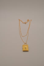 Layered gold book locket necklace