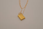 Layered gold book locket necklace