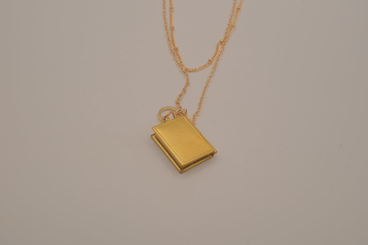 Layered gold book locket necklace