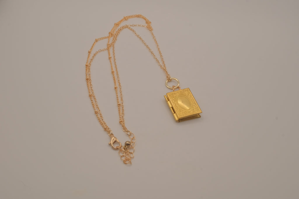 Layered gold book locket necklace