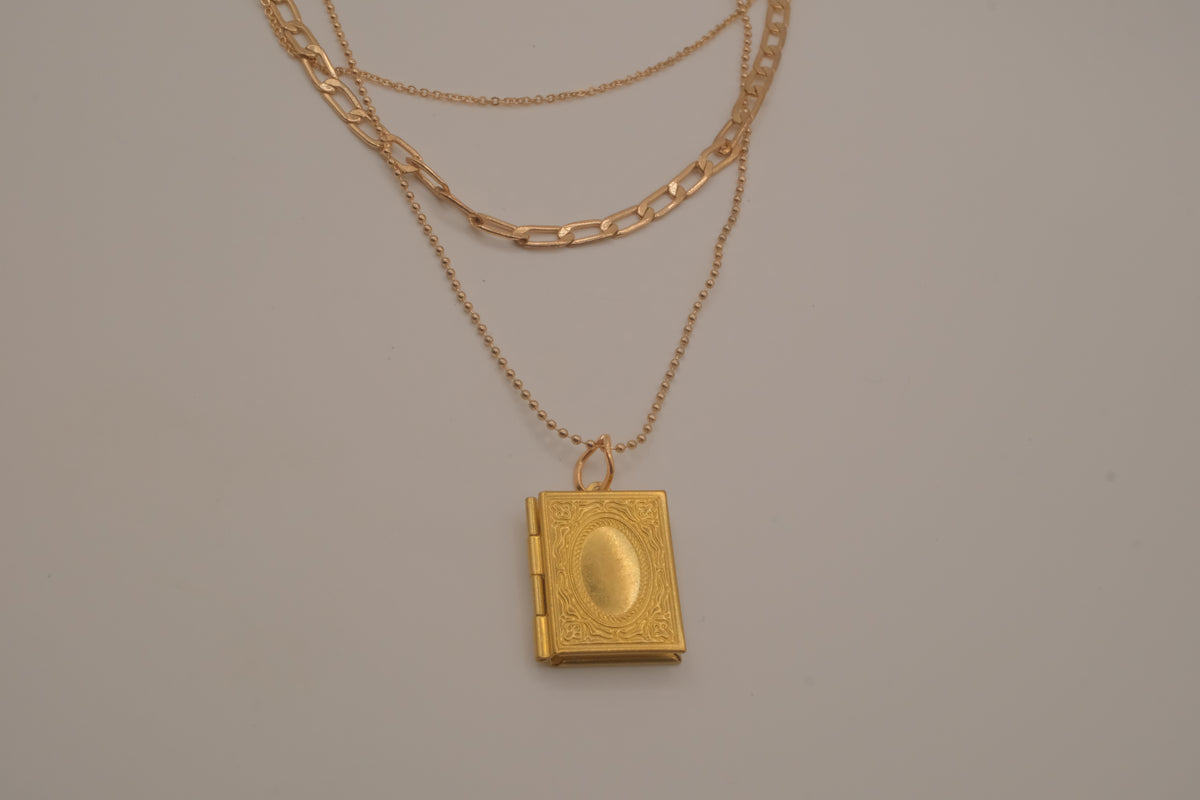Multi strand gold book locket necklace