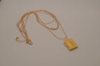 Multi strand gold book locket necklace