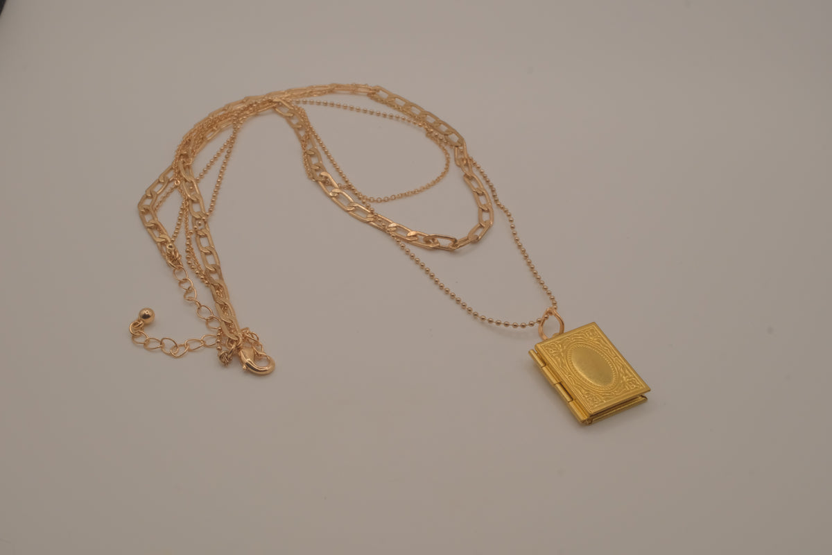 Multi strand gold book locket necklace