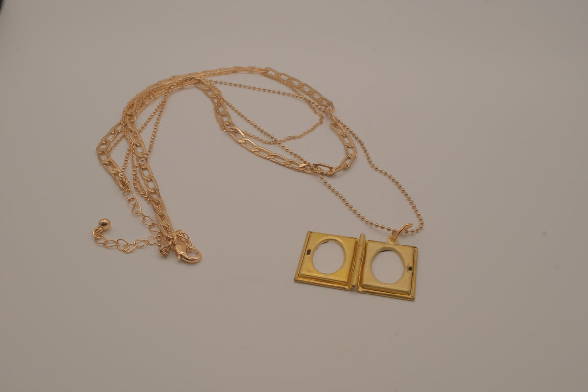 Multi strand gold book locket necklace