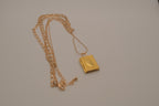 Multi strand gold book locket necklace