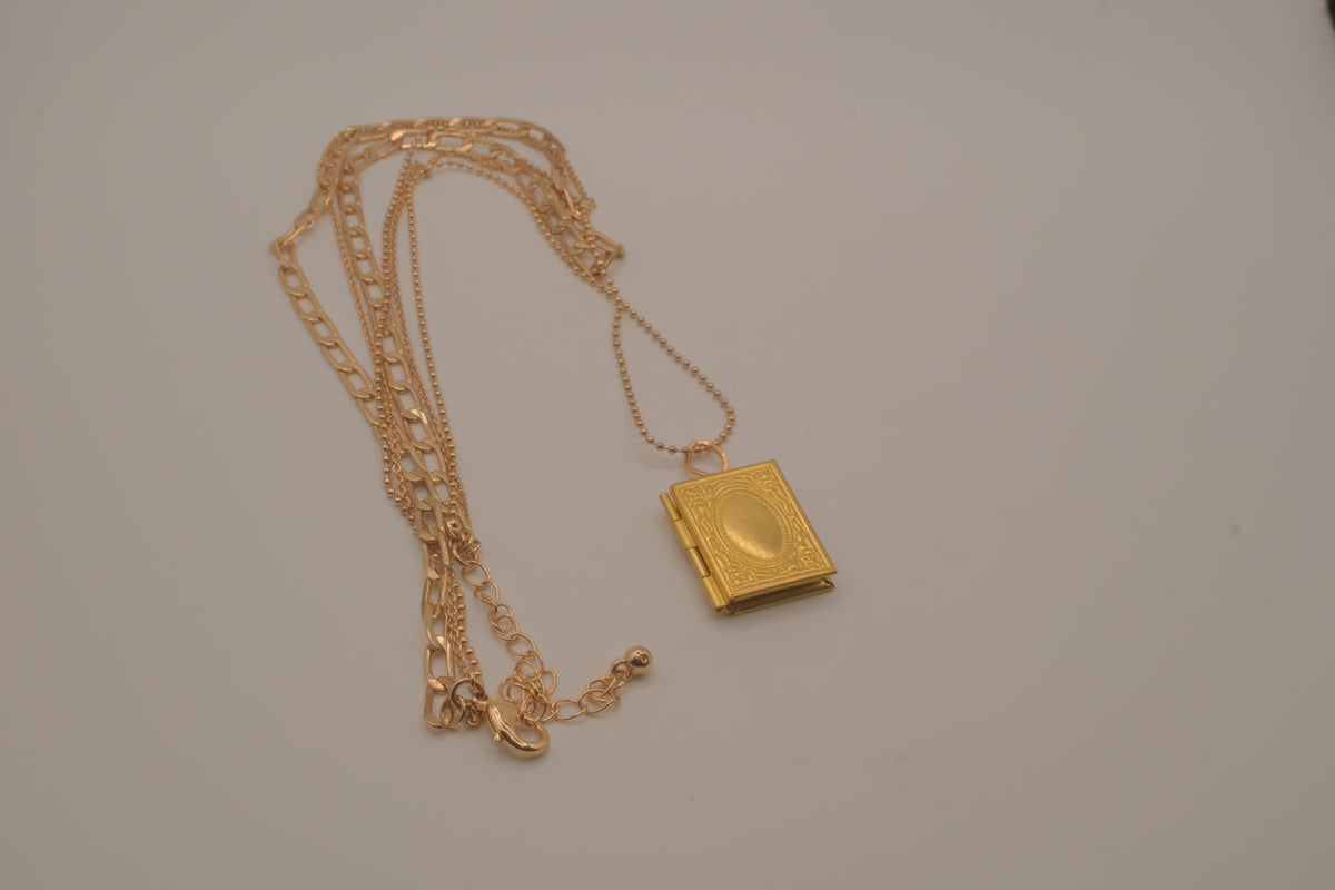 Multi strand gold book locket necklace