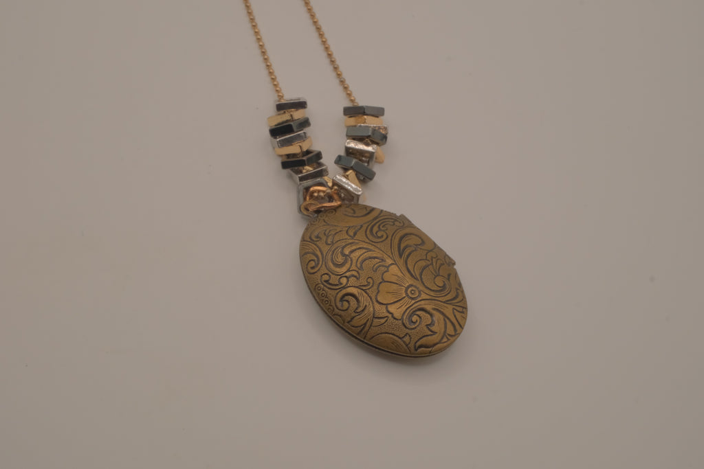 Antique brass-finished floral oval locket necklace&nbsp;