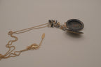Antique brass-finished floral oval locket necklace&nbsp;
