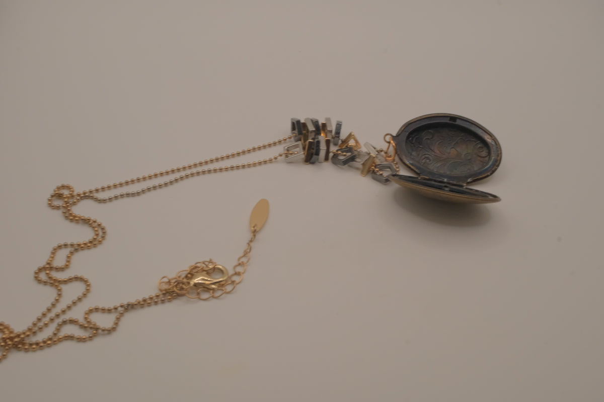 Antique brass-finished floral oval locket necklace&nbsp;