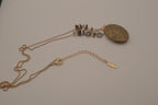 Antique brass-finished floral oval locket necklace&nbsp;