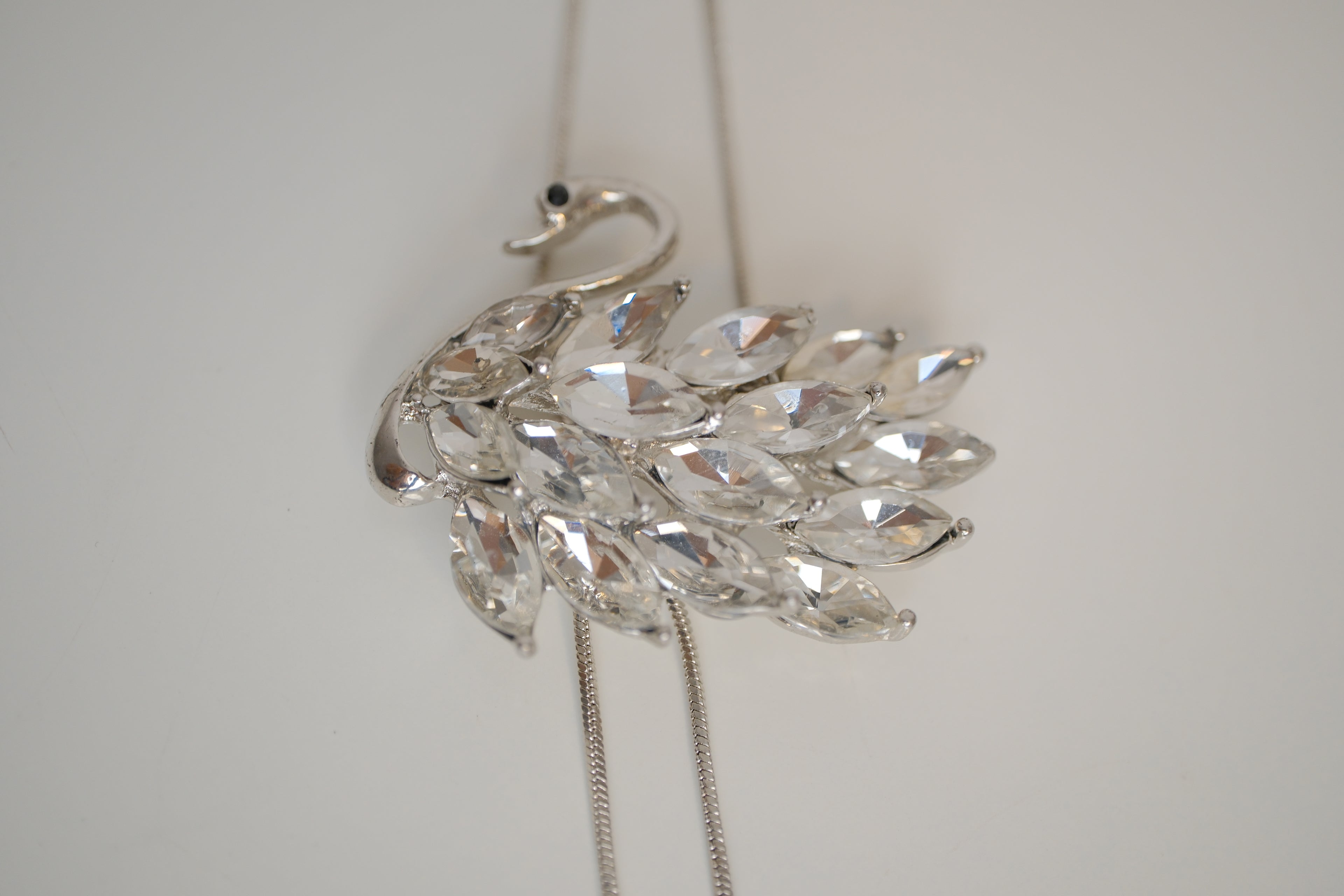 Silver tone swan bolo tie necklace
