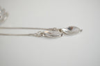 Silver tone swan bolo tie necklace