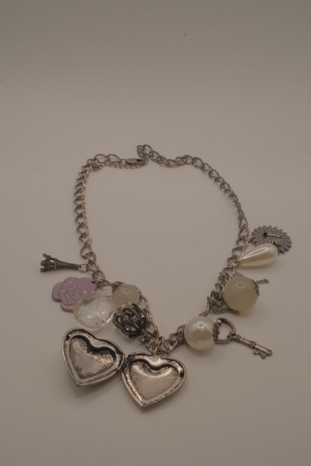 Vintage silver charm necklace with locket