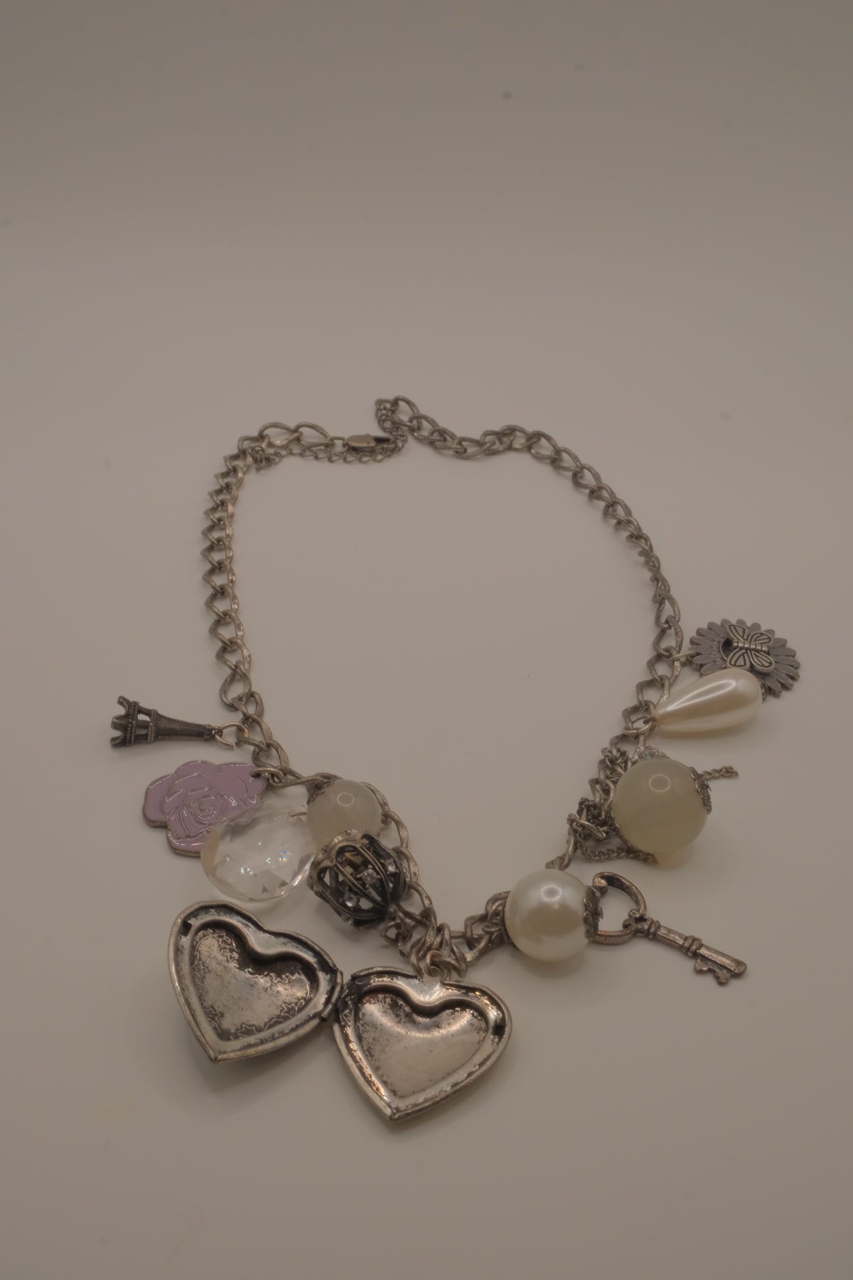 Vintage silver charm necklace with locket
